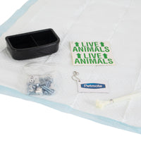 The Petmate Kennel Airline Travel Kit by Petmate is ideal for air travel, including a black dual-section dish, Live Animals stickers, a plastic bag with metal bolts and wing nuts, an ID tag with chain, zip ties, and kennel accessories all organized on a disposable pet pad.