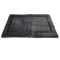 The Petmate Kennel Mat by Petmate is a soft, dark gray rectangular bed with a plush mattress and slightly raised border. Its smooth texture offers a cozy space for pets, while the non-skid bottom ensures stability against a white background.
