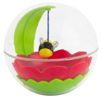 The Mad Cat Buzzy Ball Cat Toy encases a vibrant scene inside a clear plastic sphere, featuring a green leaf, red flower, and black-and-yellow bee with transparent wings. The bee hangs from a blue string above the flower for your cats enjoyment.