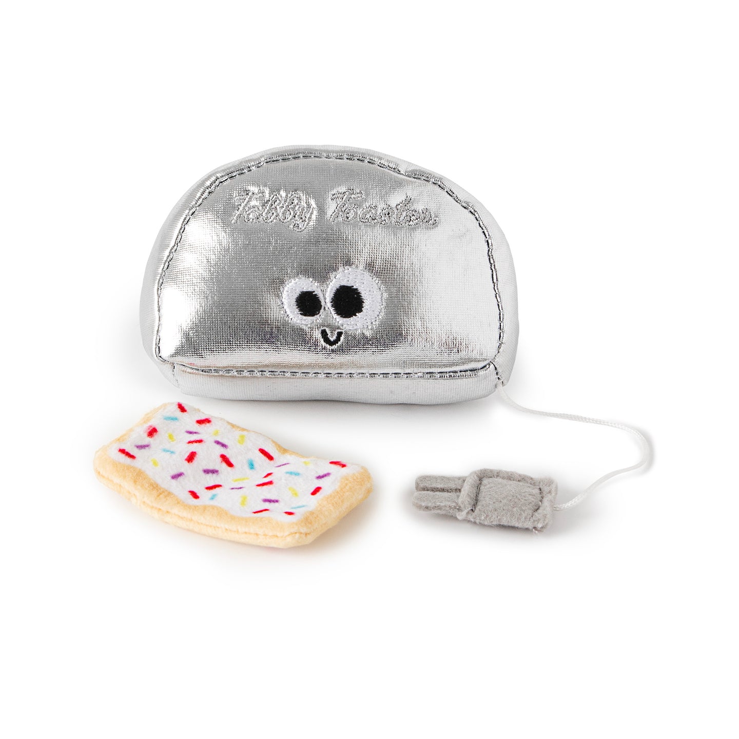 The Mad Cat Buzzing For Breakfast Cat Toy features a silver plush toaster with embroidered eyes and Baby Toaster, alongside a charming pastry sprinkled with colorful accents, plus a quirky plush plug, all infused with Silvernip blend to excite your cat for breakfast.