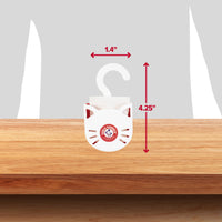 The Arm & Hammer Purrifying Pak Cat Litter Deodorizer, a white cat-shaped deodorizer with hook, sits on wood. Red arrows show it's 1.4" wide and 4.25" tall. Provides baking soda-powered litter odor protection. Gray and white background.
