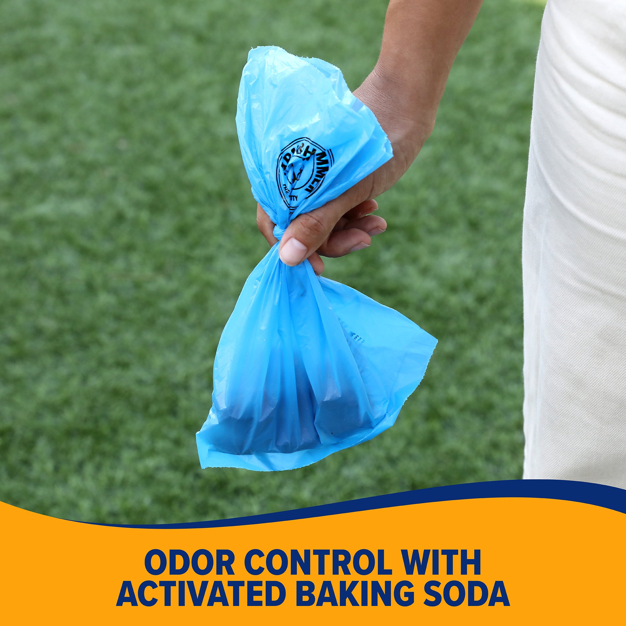 A person stands on grass, holding a tied blue bag featuring the Arm And Hammer logo. Text below reads, Odor control with activated baking soda, highlighting the convenience of the EZ Dispense Box in the Arm & Hammer Pantry Pack Waste Bags 300 ct.