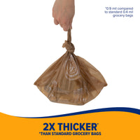 A hand grips a brown plastic bag by its tied top. This 2X Thicker Arm & Hammer Swivel Bin Pet Waste Bag, at 0.9 mil versus the typical 0.4 mil, is ideal for all needs and includes activated baking soda to reduce odor.