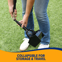 A person in jeans and white sneakers uses an Arm & Hammer Claw Poop Scooper with an extending handle on grass. Text overlay: Collapsible for Storage & Travel.