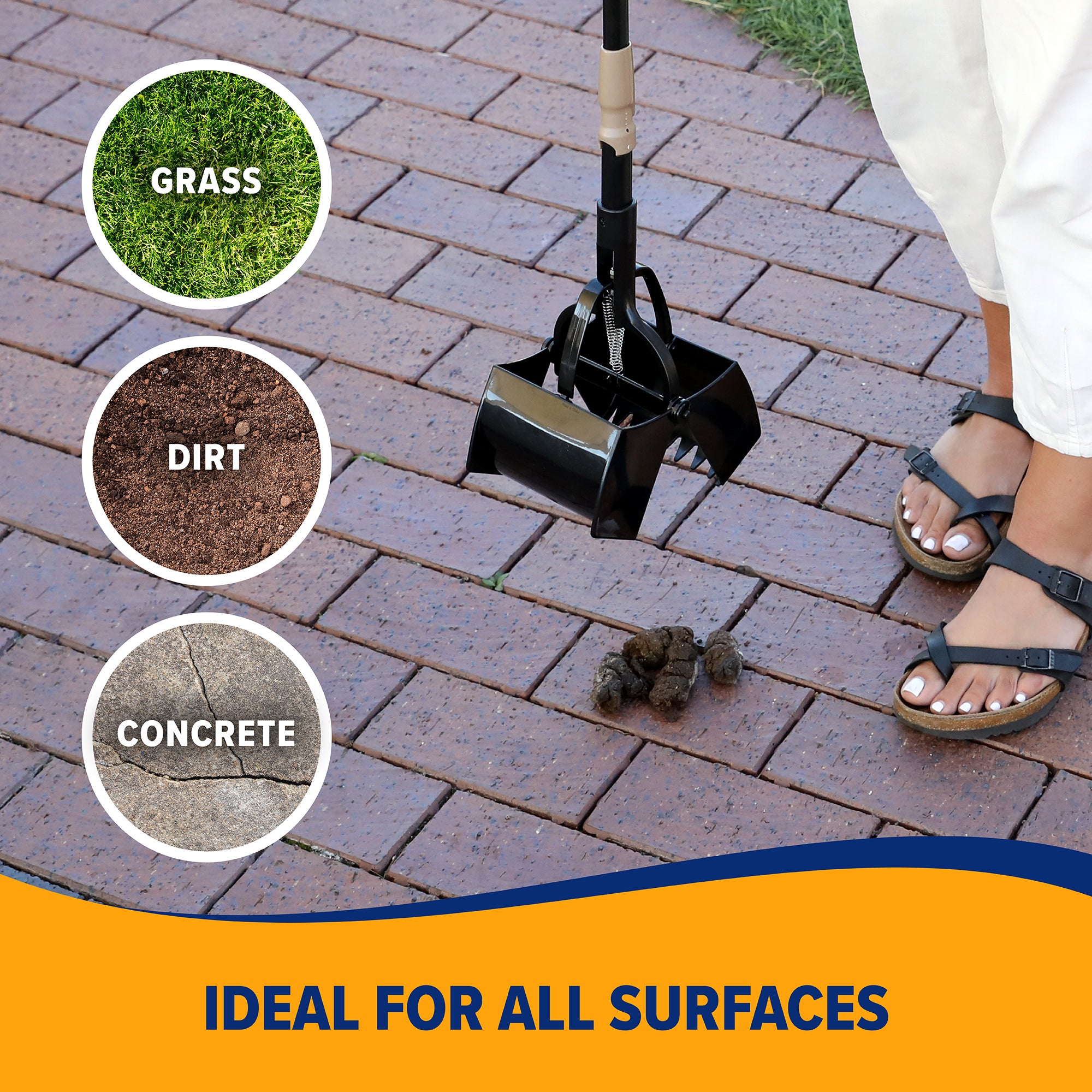 A person uses the Arm & Hammer Claw Poop Scooper with an extendable handle to pick up dog waste on a brick surface. The image shows its claw design, ideal for grass, dirt, and concrete. In the background, theres a patch of grass. Text: Ideal for all surfaces.