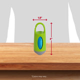 A compact green Arm & Hammer Dispenser with a top handle sits on a wooden surface. At 1.8 inches wide and 4 inches high, its ideal for storing dog waste bags with odor control. The text Colors may vary appears at the bottom.