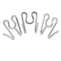 Three links from the Aspen Pet Heavy Duty Prong Collar Replacement Links are showcased in a curved line. Each silver metal link has a wavy design, set against a plain white background, offering both practicality and comfort for pets.
