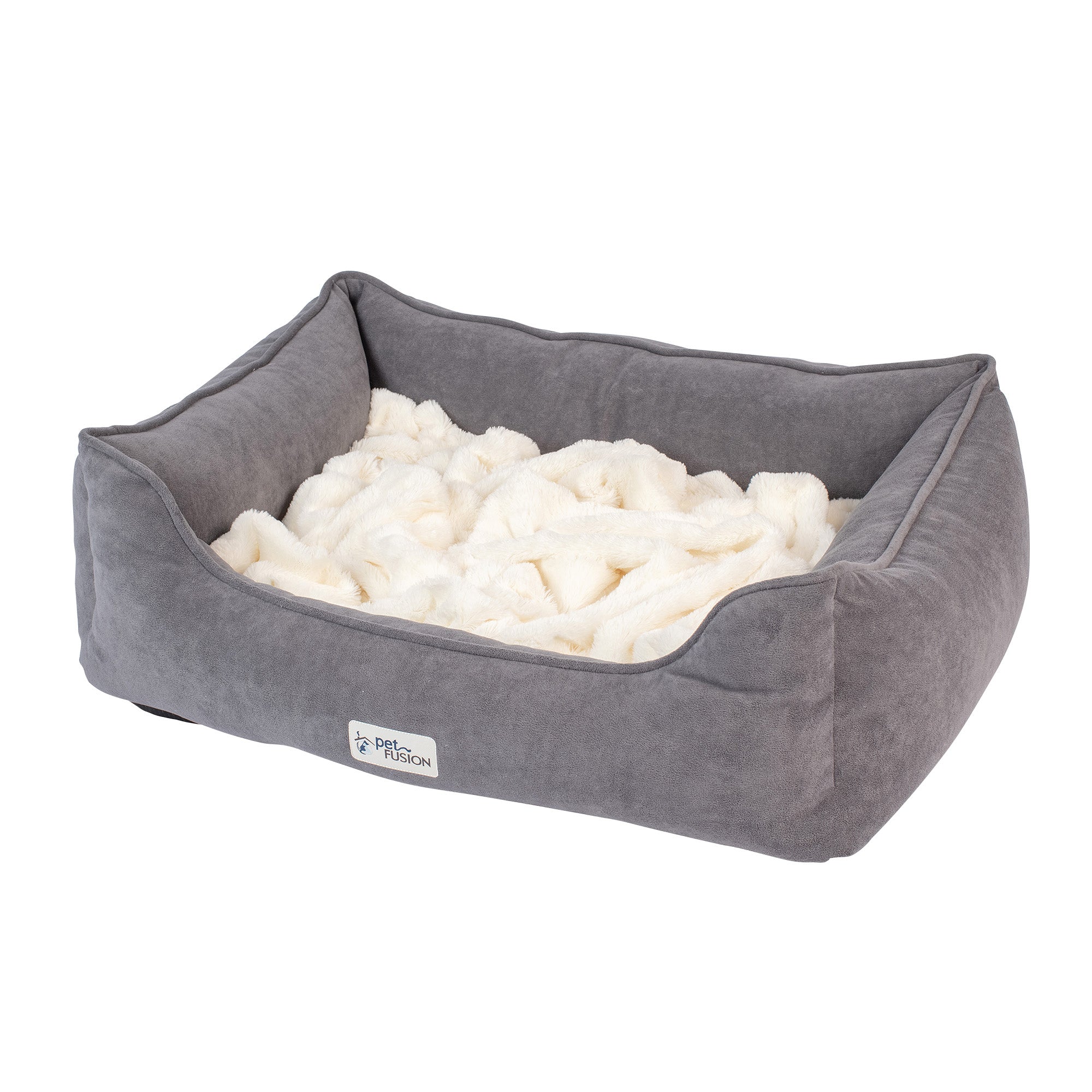 The PetFusion Calming Cuddler Dog Bed by Pet Fusion is a plush rectangular bed with soft gray sides, a fluffy white interior, and slightly raised edges for anxiety relief. A small label on the front adds style while ensuring comfort for dogs.