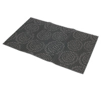 The Petmate Ribbed Foam Feeding & Watering Mat blends style and function with its rectangular dark gray felt and circular ribbed design. Its non-skid backing provides stability, making it a stylish and practical addition to any dining area.