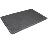 The Petmate Extra Large Litter Catcher Mat, by Petmate, is a rectangular gray mat with a textured surface and small paw print patterns in each corner. Designed for catching litter box excess, its slightly raised edge effectively contains spills.