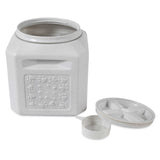 The Vittles Vault Pawprint Outback Food Storage Container is a square, gray plastic bin with embossed paw prints. Made from BPA-free plastic, it includes a lid and matching scoop, offering airtight storage ideal for pet food.