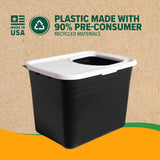 A black Arm & Hammer Top Entry Litter Box features a non-slip textured lid on a brown background. Made in the USA with 90% pre-consumer recycled materials, it includes Microban antimicrobial protection, emphasizing sustainability and hygiene, displayed alongside a recycling symbol.