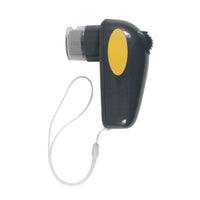 The JW Gripsoft Palm Nail Grinder For Pets, by Jw, is a portable groomer resembling a handheld flashlight. It features a crank handle, wrist strap, and cordless power with a dark green body and yellow accents. The clear end allows light to emit efficiently.