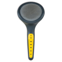 The JW Gripsoft Slicker Brush from Jw is a round black pet brush with soft pins and a long handle, featuring yellow accents and a textured grip for gentle grooming and easy handling.