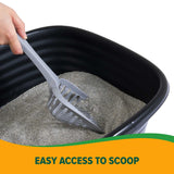A hand using a gray scoop cleans clumping litter in a black Arm & Hammer SimplyRecycled Wave Litter Box. A green and orange band at the bottom reads EASY ACCESS TO SCOOP.