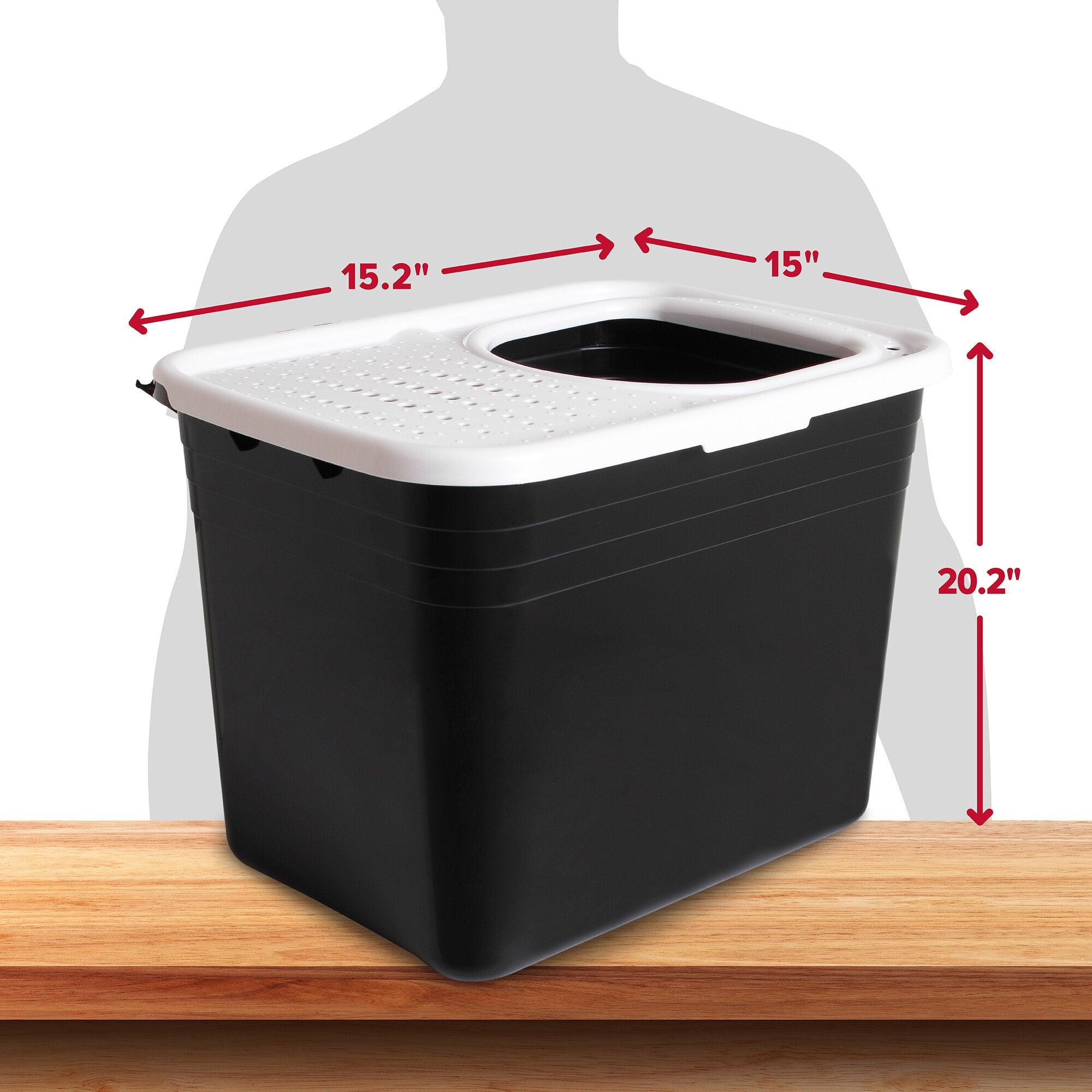 The Arm & Hammer Top Entry Litter Box, a black rectangular container with a non-slip textured lid and Microban antimicrobial protection, measures 15.2 W x 15 D x 20.2 H and sits on a wooden surface with a silhouette nearby for scale.