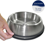 A hand holds a PetFusion Premium Brushed Anti-Tip Dog & Cat Bowl from the stackable set, showcasing its high-grade stainless steel and anti-slip features. A label at the top right highlights these benefits.