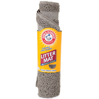 The Arm & Hammer Half Circle Litter Mat, featuring the iconic yellow label, captures litter scatter with its textured surface, ensuring floors stay clean and tidy.