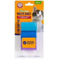 The package of Arm & Hammer Deluxe 2-In-1 Litter Scoop Waste Bag Refills by Arm And Hammer includes odor-neutralizing bags with activated baking soda. It features two rolls of blue and purple bags, totaling 45 litter scoop waste bags, and highlights a cute cat image.