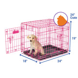 A small puppy is inside a Petmate 2 Door Wire Puppy Crate with an open door. Ideal for house training, this pink crate is 24 high, 19 wide, and 18 deep. An inset silhouette shows the size comparison of a sitting cat to the crate.
