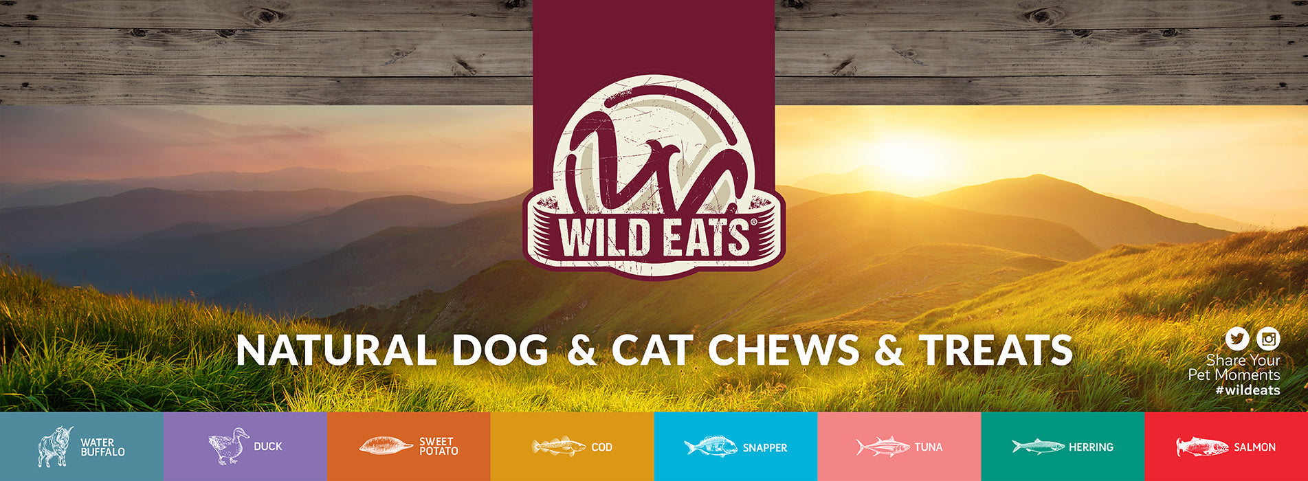 Banner for Wild Eats with a mountain landscape at sunset. Logo in the center with Natural Dog & Cat Chews & Treats below. Colorful icons of various animal proteins at the bottom.
